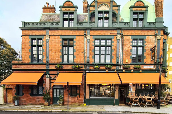 Featured Victorian-style retractable awning for Roebuck pub  in Borough, London by Deans Blinds