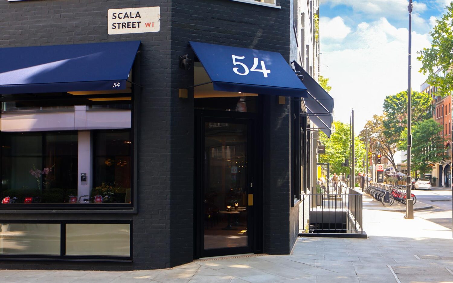 Deans RIB® fixed panel canopy installed at Bourne Office Space, enhancing the building’s façade