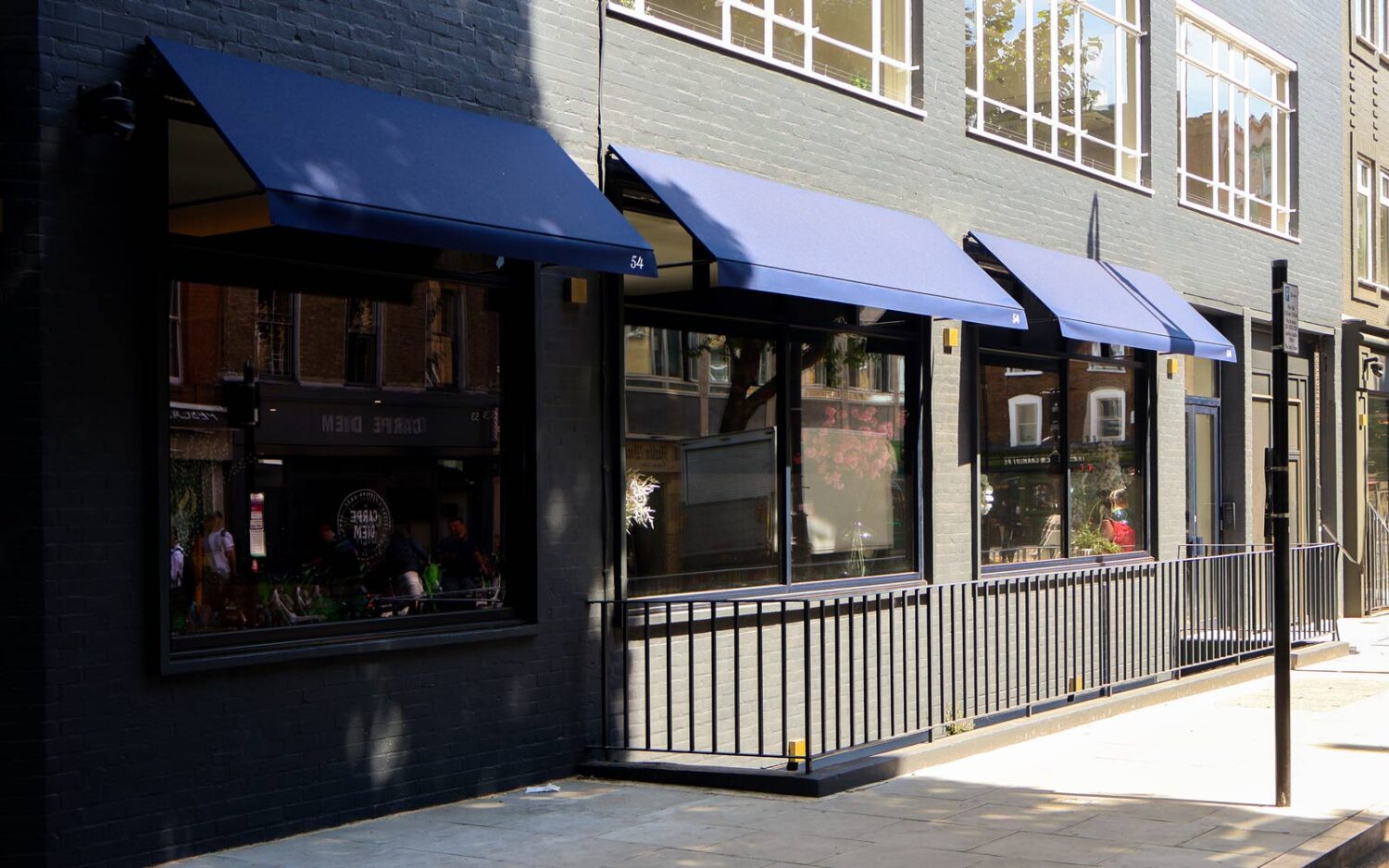 Deans RIB® fixed panel canopy installed at Bourne Office Space, enhancing the building’s façade