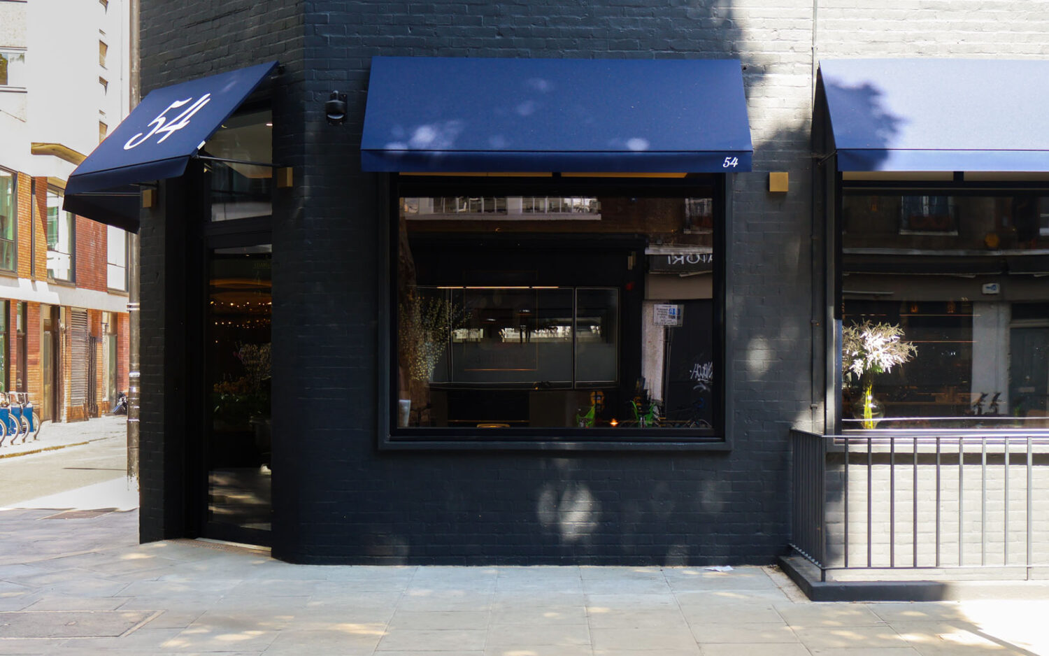Deans RIB® fixed panel canopy installed at Bourne Office Space, enhancing the building’s façade